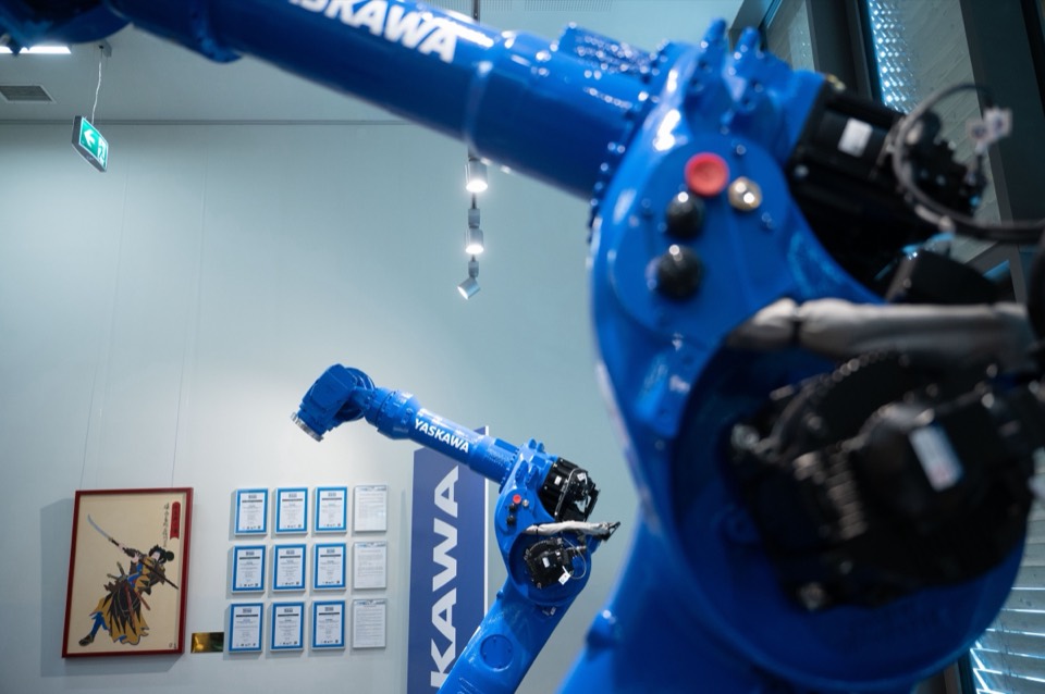 Blue Yaskawa Motoman robot arms